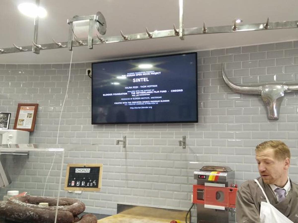 Écran et menu dynamique humelab media chez un commerçant de bouche