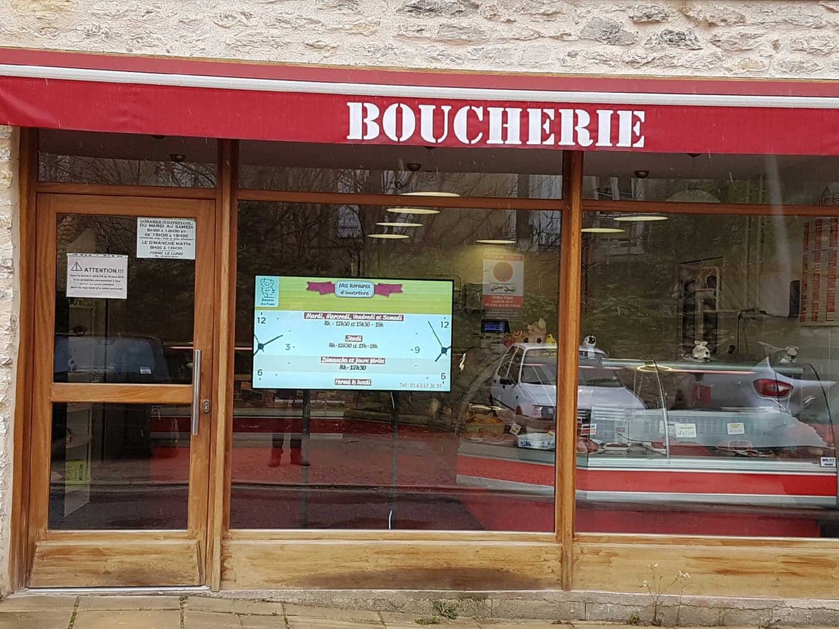 Écran et menu dynamique humelab media chez un commerçant de bouche
