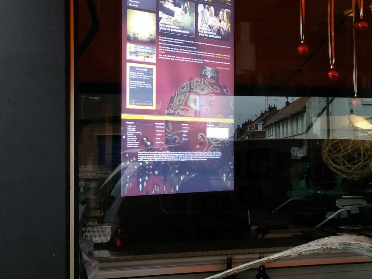 Écran et menu dynamique humelab media chez un commerçant de bouche