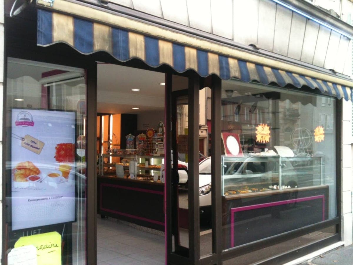 Écran et menu dynamique humelab media chez un commerçant de bouche